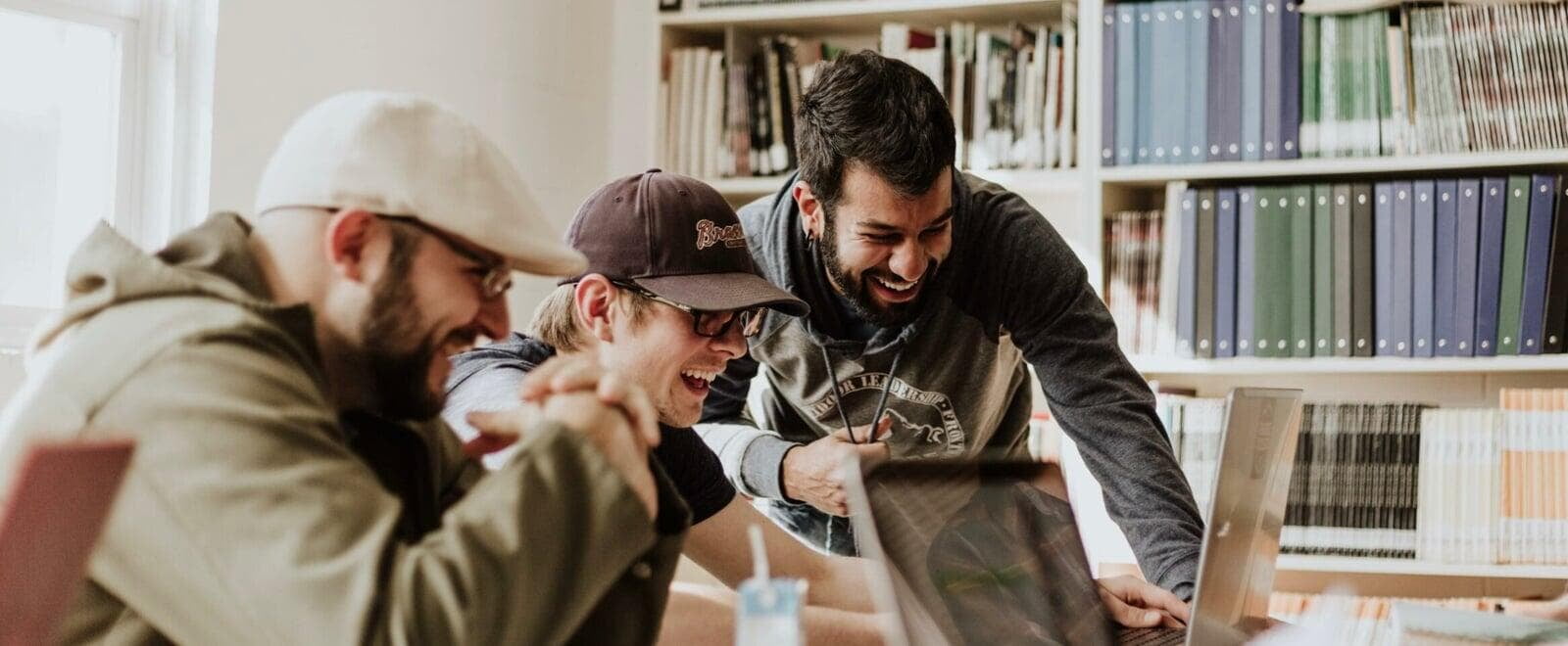 group of three men excited about business and growing their ambitions